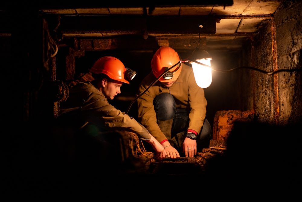 Coal miners in a mine tunnel